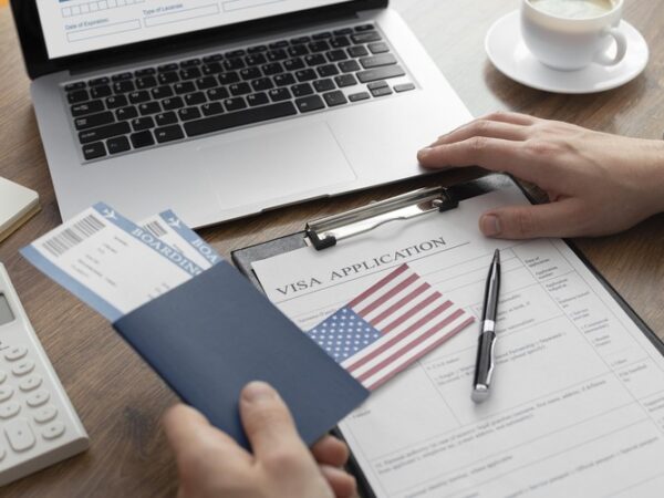 visa-application-composition-with-american-flag (1) (1) visa-application-composition-with-american-flag (1) (1)